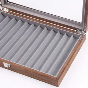 12 slot vintage wooden pen display box with clear glass lid and soft gray velvet interior.