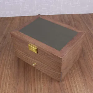 Wooden watch jewelry storage box dual layer design with clear glass top and gold hardware.