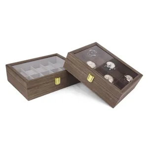 Wooden watch box display organizer with glass top and multiple compartments for storage.