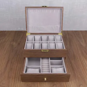 Wooden double-layer watch and jewelry storage box with soft grey velvet interior display case.
