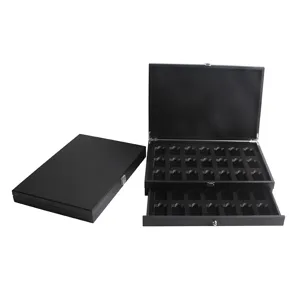 Boîte de rangement multicouche en bois noir avec tiroirs pour présentation et collection.