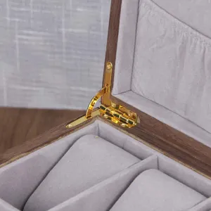 Wooden watch box interior detail, grey velvet lining and gold metal hinge showcase