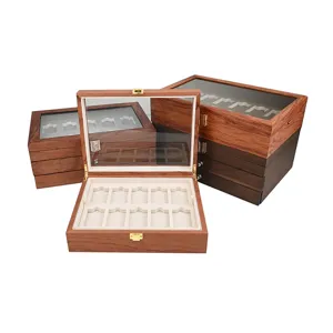 Boîte de rangement multicouche en bois avec couvercle en verre et fentes en velours.
