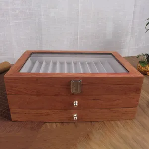 Wooden pen display box detail, multi-slot fountain pen storage organizer with glass lid.