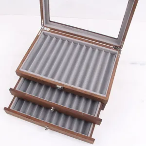 Vintage wooden pen display box with multi-layer drawers and glass lid for stationery storage.
