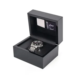 Black wooden watch box with glossy lacquer finish, soft leather pillow and gift card slot.