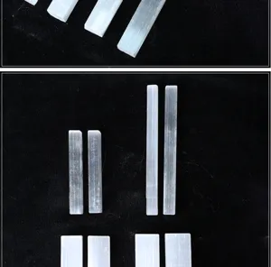 Detailed view of natural Moroccan selenite crystal raw stone rectangular stick decoration.