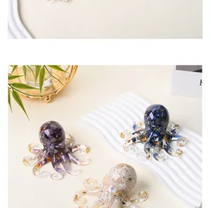 Resin crystal octopus ornament detail, natural stone chips inside lovely desktop decor.