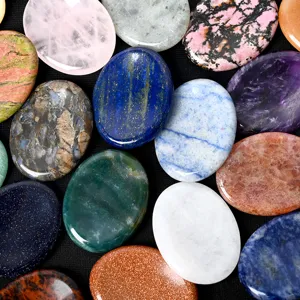 Natural crystal worry stone set, polished oval palm stones for thumb massage and stress relief.