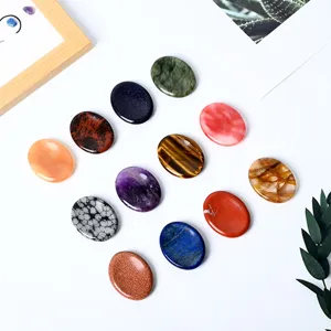 Natural crystal worry stones set, polished oval thumb massage stones for stress relief and healing.