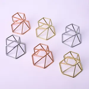Geometric metal display stands for crystal balls, spheres, and eggs, set of 6 in multi colors.