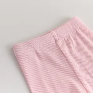 Baby girls ribbed pink leggings waist detail, soft elastic toddler pants knit fabric.