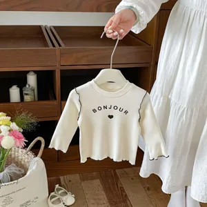 T-shirt a maniche lunghe a costine per neonata con stampa di lettere e volant per abbigliamento.