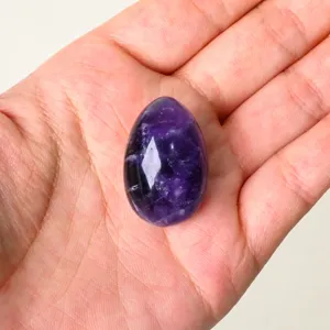 Natural amethyst crystal egg ornament, polished gemstone mini egg for home decor and Easter.