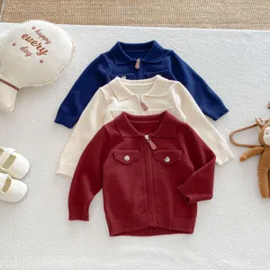 Baby knitted cardigan set featuring lapel collar, front zipper, and pocket details for autumn.