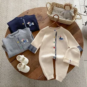 Cute infant knitted romper cardigan set with adorable dachshund embroidery for autumn.