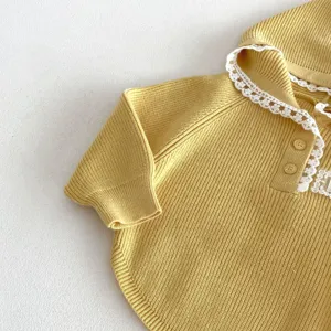 Infant baby yellow knit hooded hoodie top detail, cute white lace trim, soft knitwear.