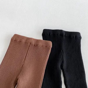 Baby knitted ribbed leggings, soft stretch waist infant trousers in brown and black colors.