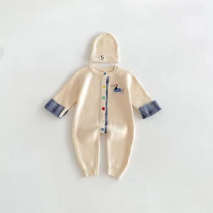 Infant knit romper and beanie set with dachshund embroidery, plaid cuffs and buttons.