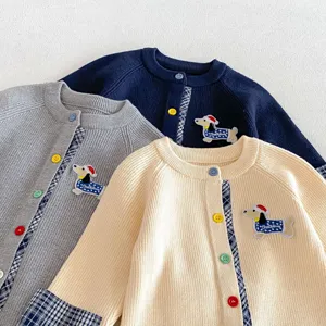 Baby knit cardigan with cute dachshund embroidery, colorblock plaid details, soft toddler top.