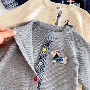 Baby knit cardigan featuring cute dog embroidery, colorful buttons and plaid trim.