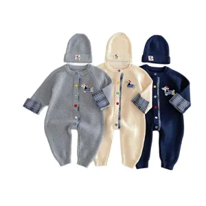 Baby knitted romper and beanie hat set with cute dachshund embroidery and plaid cuffs. Autumn infant clothing.