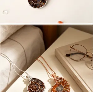 Detailed shot of handmade ammonite fossil slice pendant necklace, natural shell jewelry design.