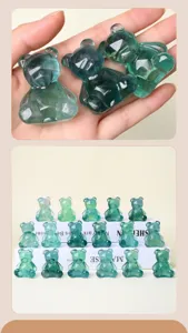 Green fluorite crystal bear figurine detail view, handmade geometric carved crystal animal ornament
