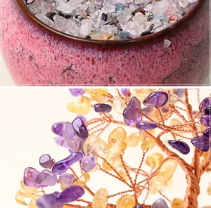 Detailed close-up of natural crystal money tree bonsai branches and ceramic pot with stones.