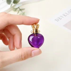 Pendentif flacon de parfum cœur en cristal violet natural avec bouchon couronne
