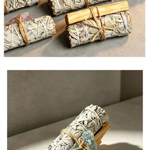 Close-up detail of white sage smudge stick bundle with palo santo and raw crystal set.