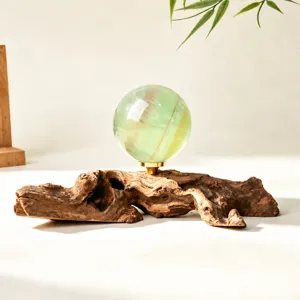 Natural solid wood weathered root carving base with crystal ball ornament for home decor display.