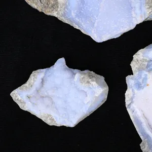 Natural blue agate raw stone mineral specimen with crystal geode for home decor and display.