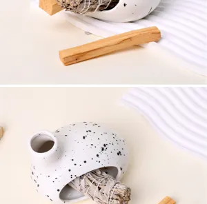 Ceramic sage and palo santo holder set with speckled white burner for home aromatherapy use.
