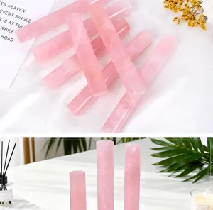 Natural rose quartz crystal cylinder pillar for home office decor, smooth polished crystal wand detail.