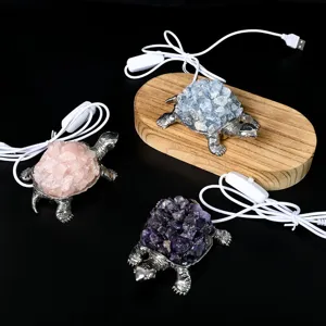 Natural crystal stone turtle figurine desk ornament with USB cord for home and office decor.