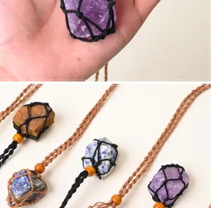Detailed view of handmade natural stone woven necklace with adjustable cord and crystal pendants.
