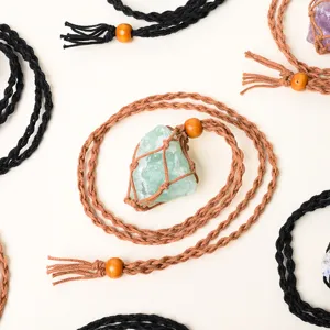 Handmade woven stone net necklace with adjustable wooden beads and natural crystal pendants.