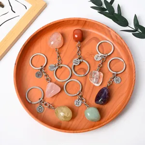 Natural crystal tumbled stone zodiac keychains for car keys and bags, trendy spiritual pendant.