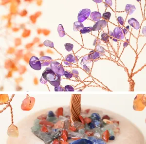 Close up view of handmade crystal money tree with purple amethyst chips and copper wire details.