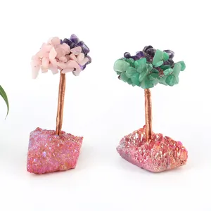 Handcrafted natural crystal money tree with copper wire and aura quartz base for home decor feng shui.