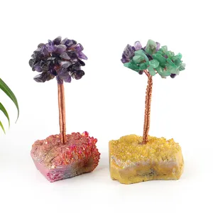 Handcrafted crystal money tree with electroplated quartz cluster base for home decor.