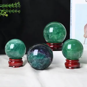 Natural green fluorite crystal sphere ornament with wooden base for home desktop decor display