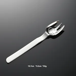 Stainless steel children fork detail view, cute koala pattern, safe tableware for baby feeding.