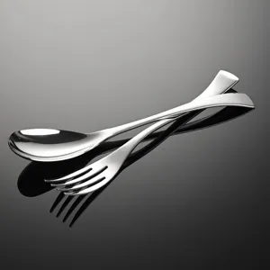 Ensemble de cuillère et fourchette de service en acier inoxydable, élégant pour hôtel.