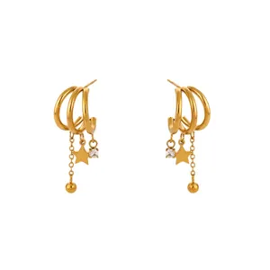 Gold multi-layer hoop earrings with star crystal charms, stylish minimalist main view.