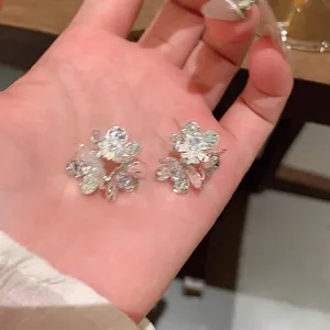 Silver crushed texture zircon flower stud earrings for women, exquisite and elegant daily jewelry.