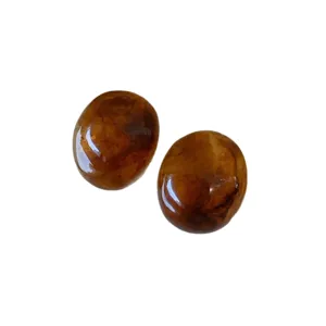 Amber style oval cabochons main product display showcasing glossy mottled brown texture.