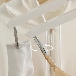Portant à vêtements pliant de voyage portable avec pinces pour sécher les chaussettes.