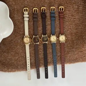 Women quartz watch with polygonal dial and genuine leather strap, elegant fashion timepiece.